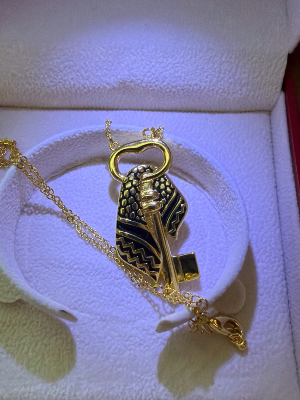 Gold-Tone Key Pendant Necklace with Black Enamel Accent